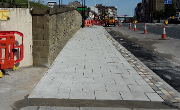 New paving on North Bridge Street, including block feature running against the kerb-line.