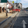 Continuation of paving and kerbing works on the western side of North Bridge Street.