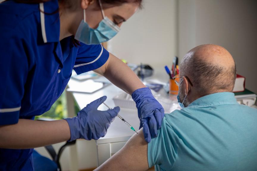 Pic of someone being vaccinated Pic of someone being vaccinated