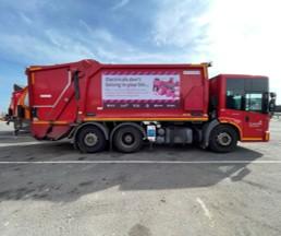 bin lorry with sign