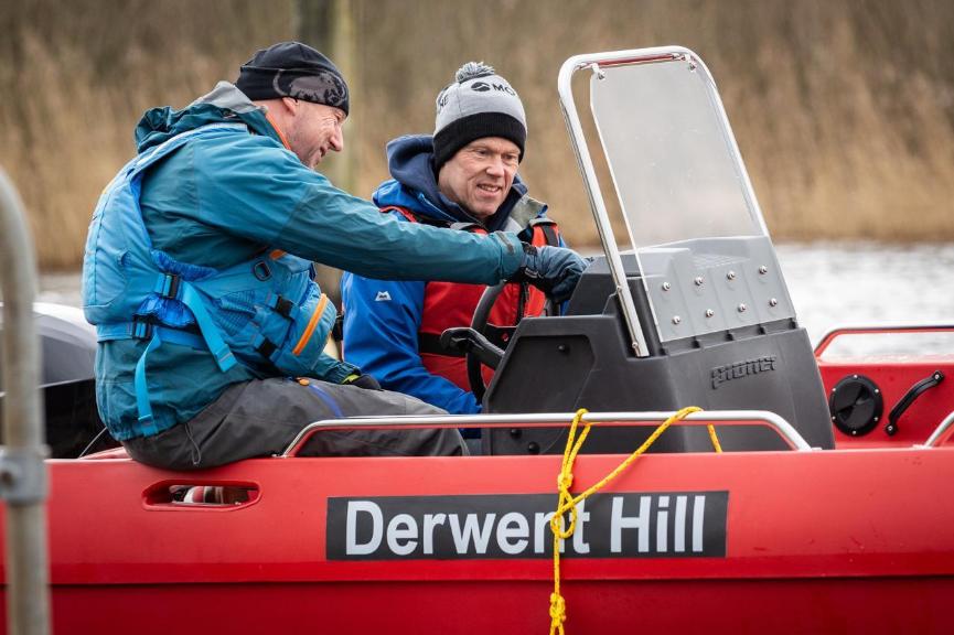 Dr Paul Holland with the new safety and rescue boat he has funded for Derwent Hill